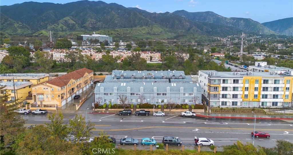 Photo 1 of 29 of 14425 Foothill Boulevard Unit 17 townhome