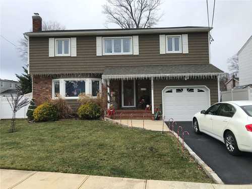 $825,000 - 4Br/3Ba -  for Sale in Wantagh Woods, Wantagh