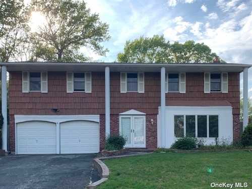 $699,000 - 4Br/4Ba -  for Sale in Commack